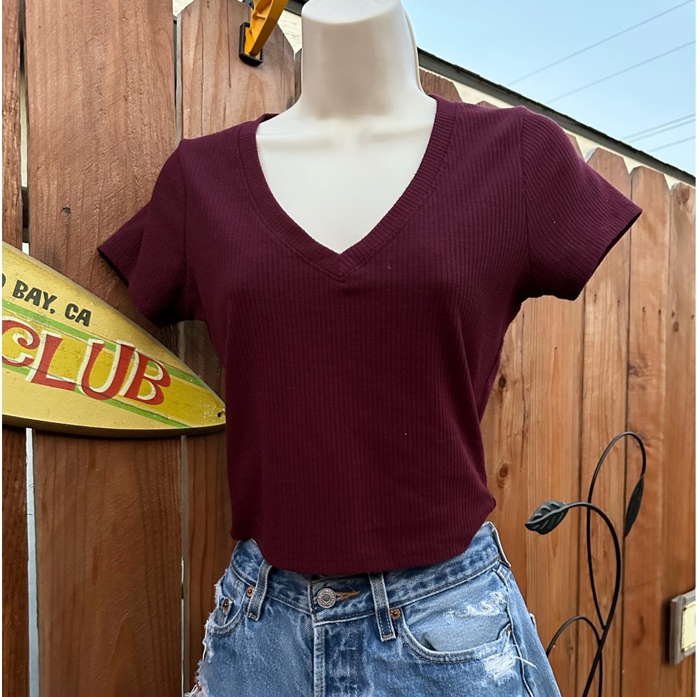 Cute Rigid Half/ Crop Top 
brand Bozzolo
Size Medium but a small medium